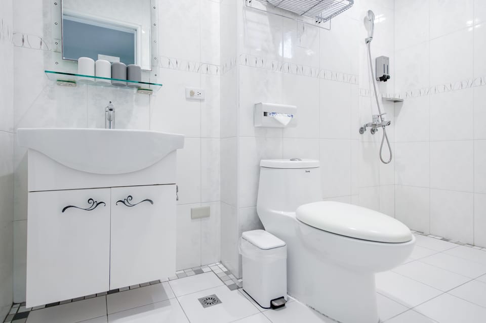 Quadruple Room, Balcony | Bathroom | Shower, hair dryer, slippers, towels