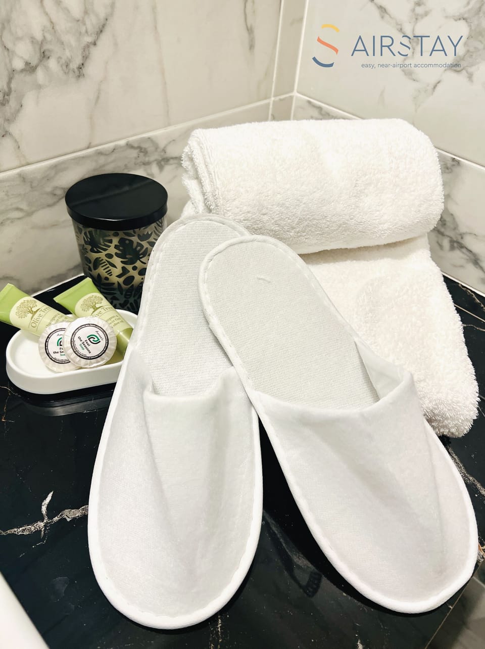 Shower, rainfall showerhead, hair dryer, towels