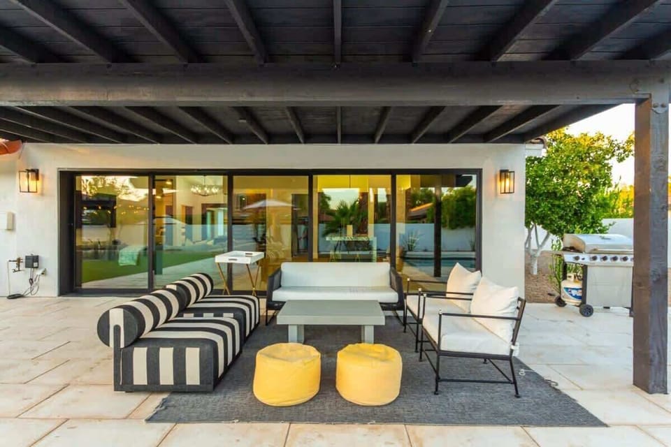 Covered outdoor patio with al-fresco living pool side & BBQ