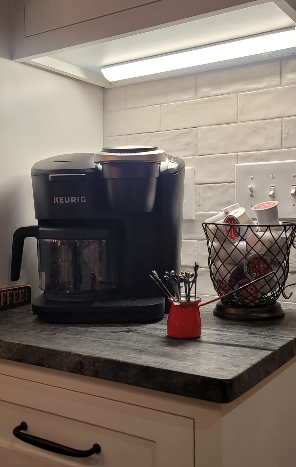 Drip and pod coffee maker.  We supply coffee, tea, sugar and creamer.