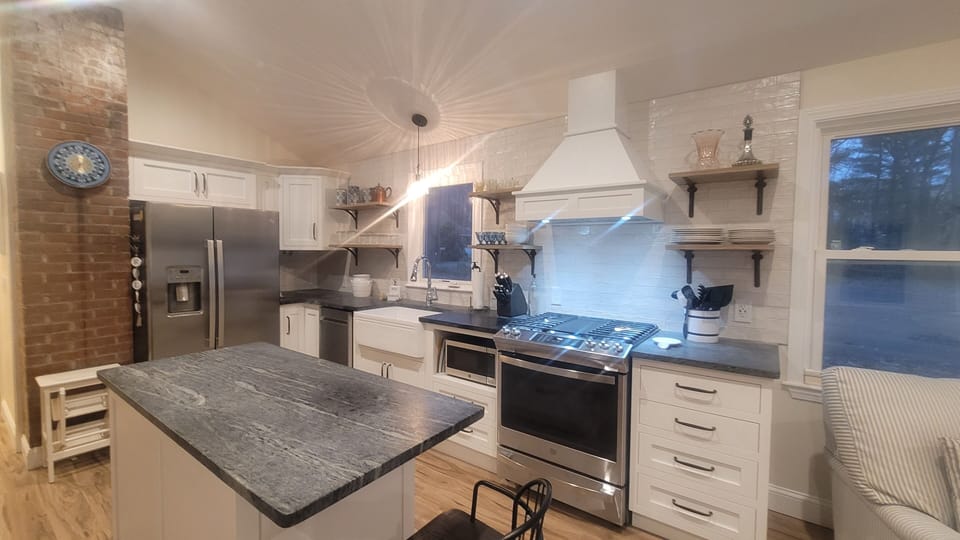 Designer's Kitchen with Soapstone Counter. filtered ice through the fridge.