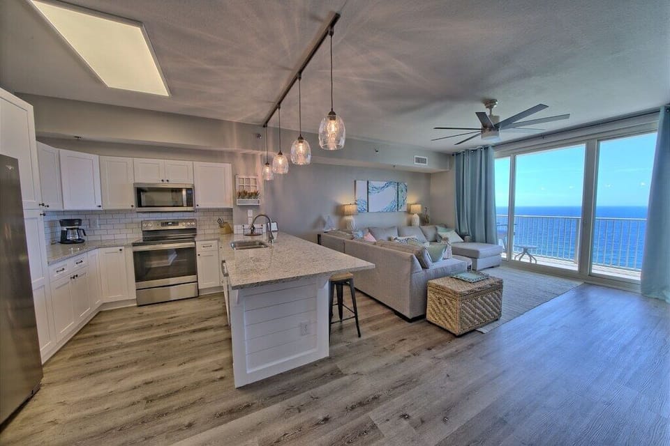 Cook with a view! 🌊🍽️ This open kitchen offers breathtaking oceanfront scenery, making every meal feel like a getaway. Whether you're brewing coffee at sunrise or preparing dinner with a sunset backdrop, this is coastal living at its finest.