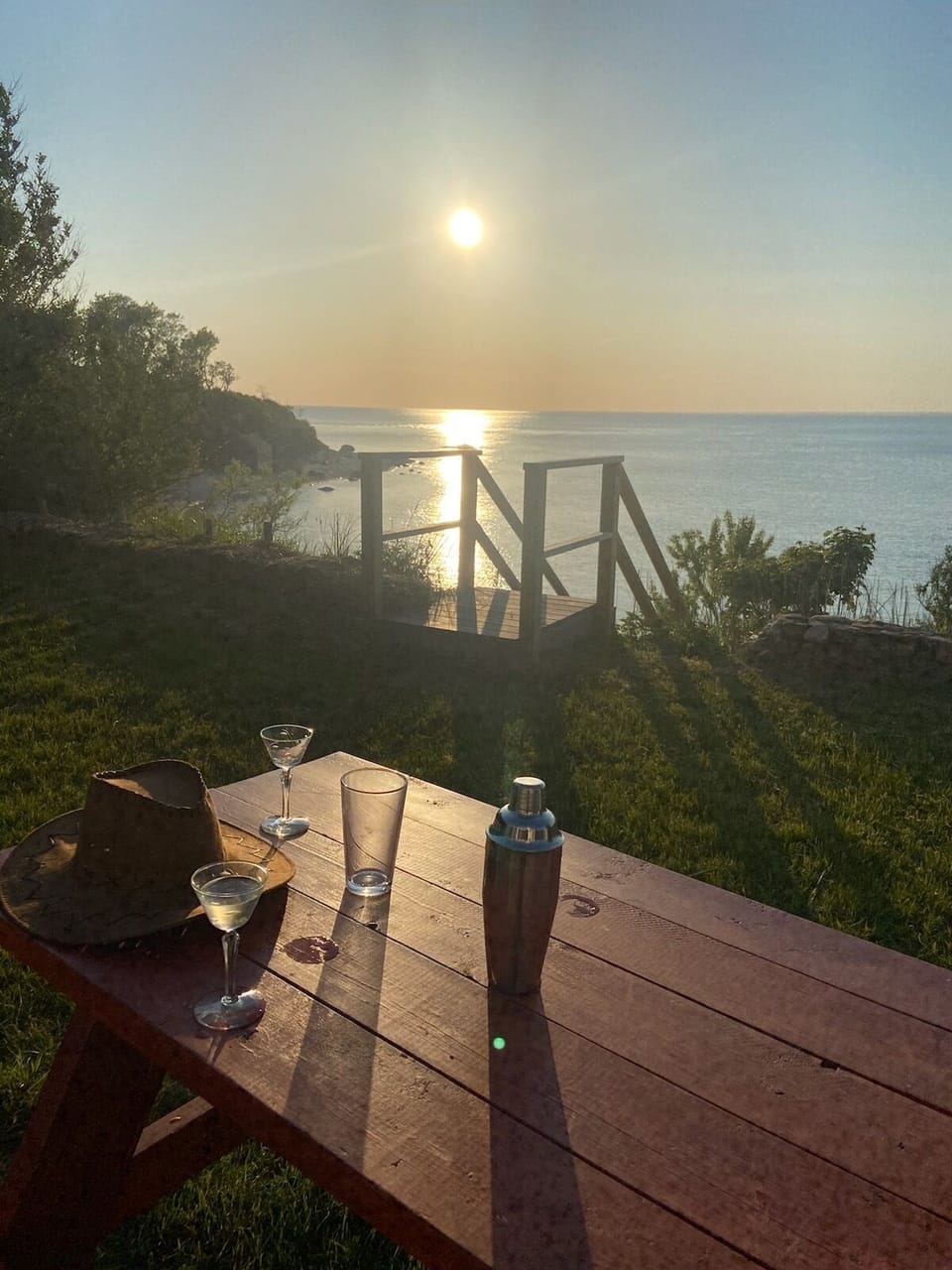 Perfect for lazy evenings! Direct beach access via staircase from backyard