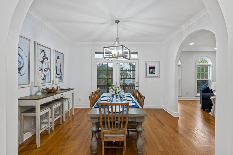 Dining table for 8 guests with additional high top table for 3
