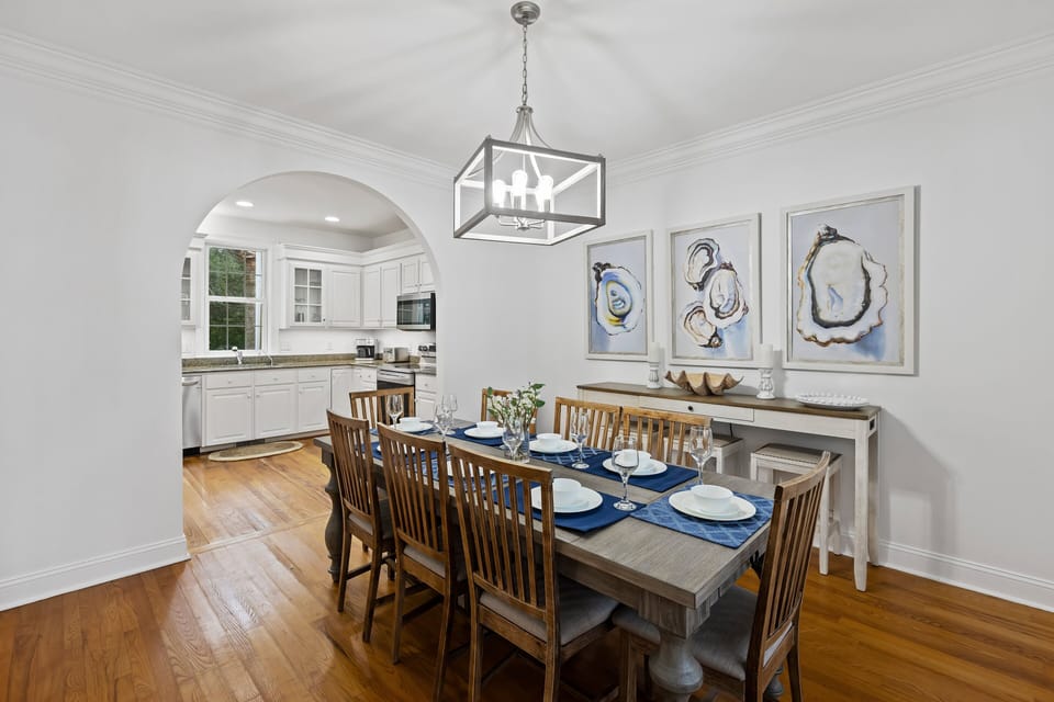 Dining table for 8 guests with additional high top table for 3