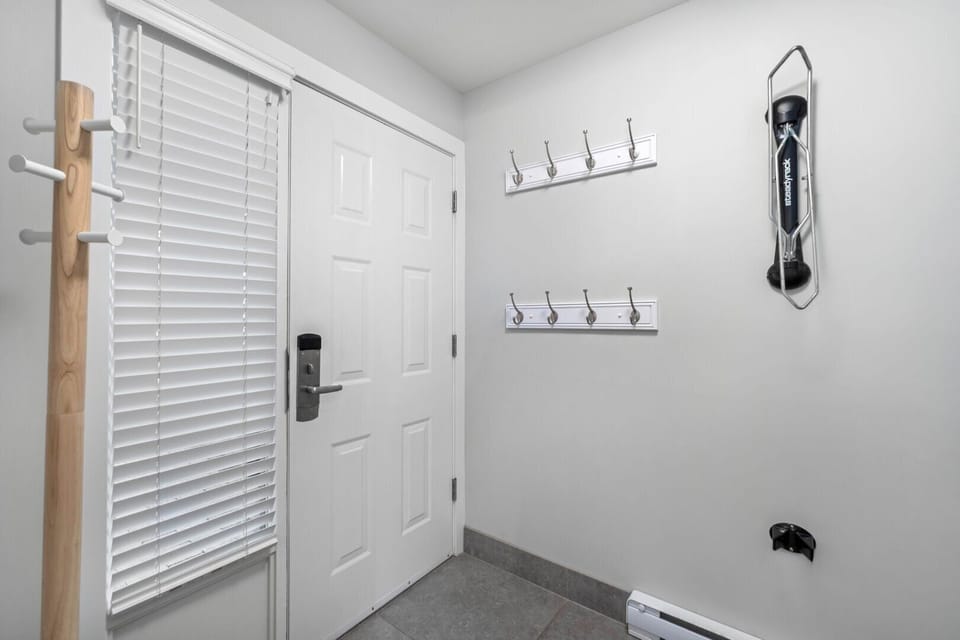 A spacious entryway with practical storage for gear and shoes.