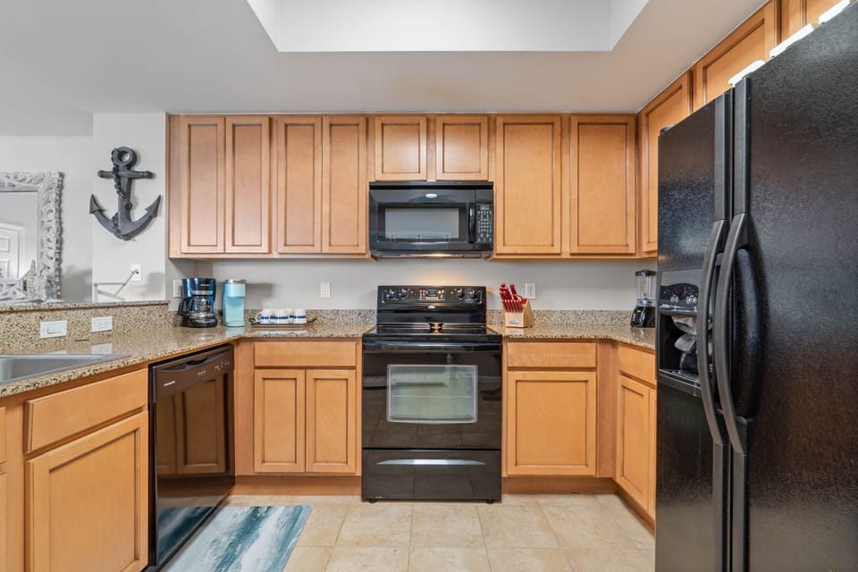 Spacious kitchen with all the comforts of home, Refrigerator with Ice Dispenser.
