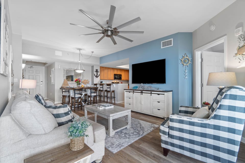 Spacious and comfy living room space with Smart TV.  Plaid Chair no longer Avail