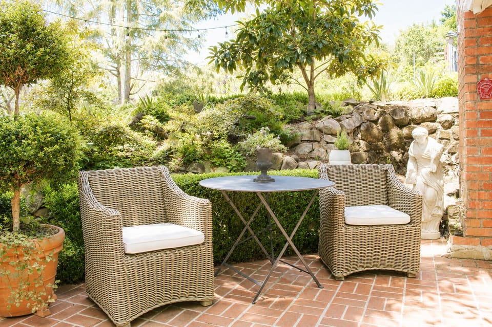 Pottery barn chairs and cushions, comfy spot for charcuterie!
