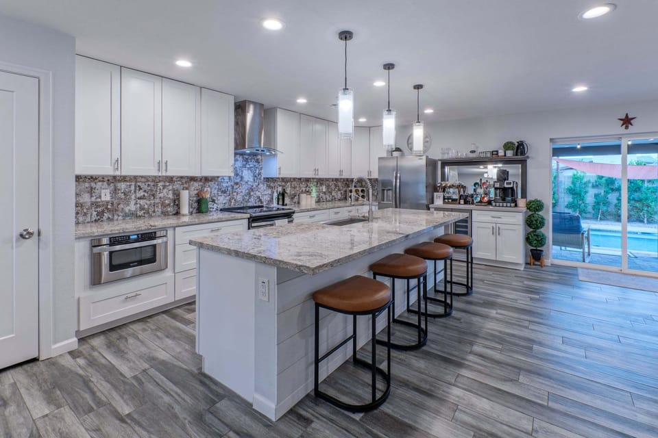 Kitchen is remodeled with generous work space and high end appliances.