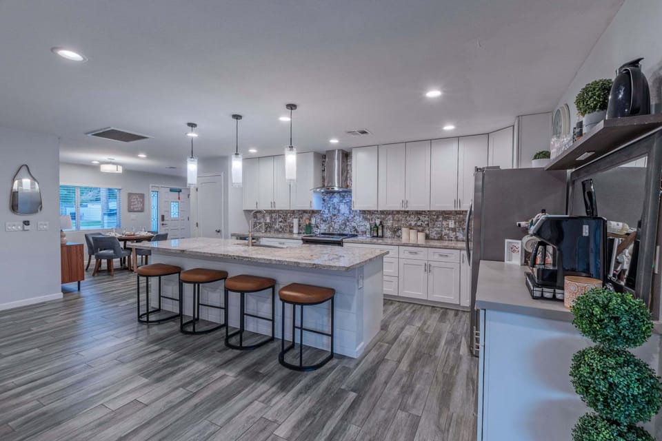 Modern kitchen is well stocked with everything you need for home cooked meals.