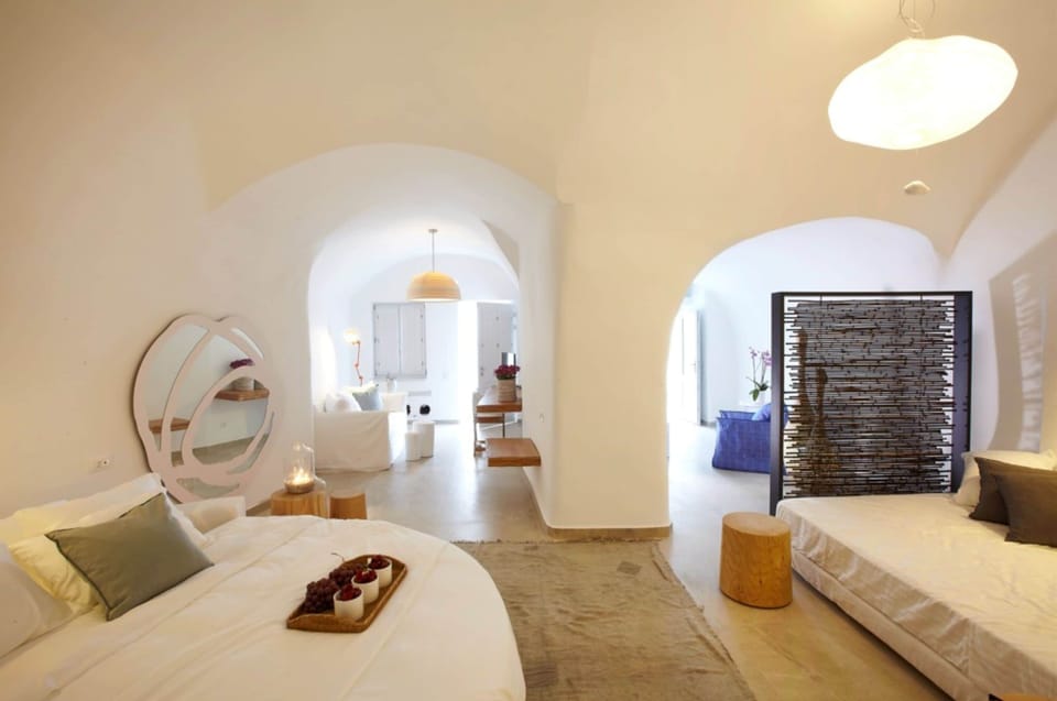 Grand Suite, Pool, Caldera View | Minibar, in-room safe, individually furnished, desk