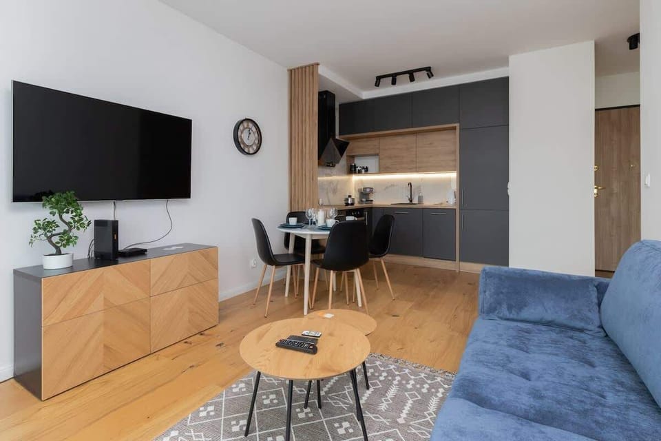 Watch your favorite shows on the flat-screen television in the elegant living area.