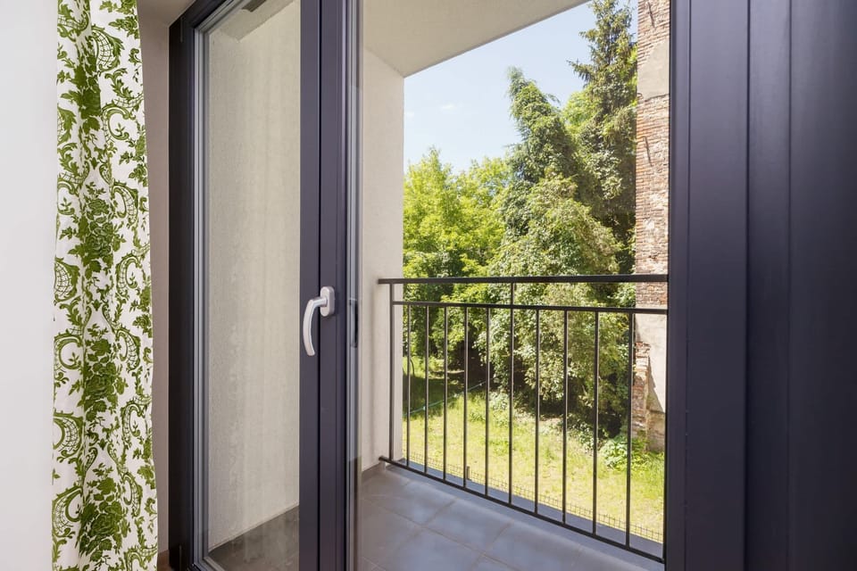 The balcony's peaceful ambiance is ideal for unwinding. 
