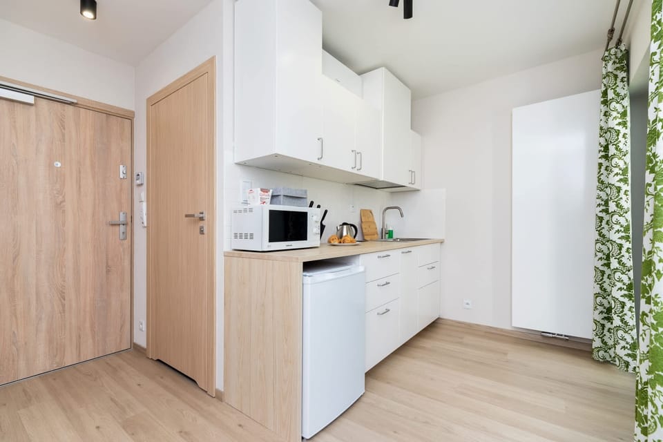 The kitchenette's practical layout maximizes space and functionality.