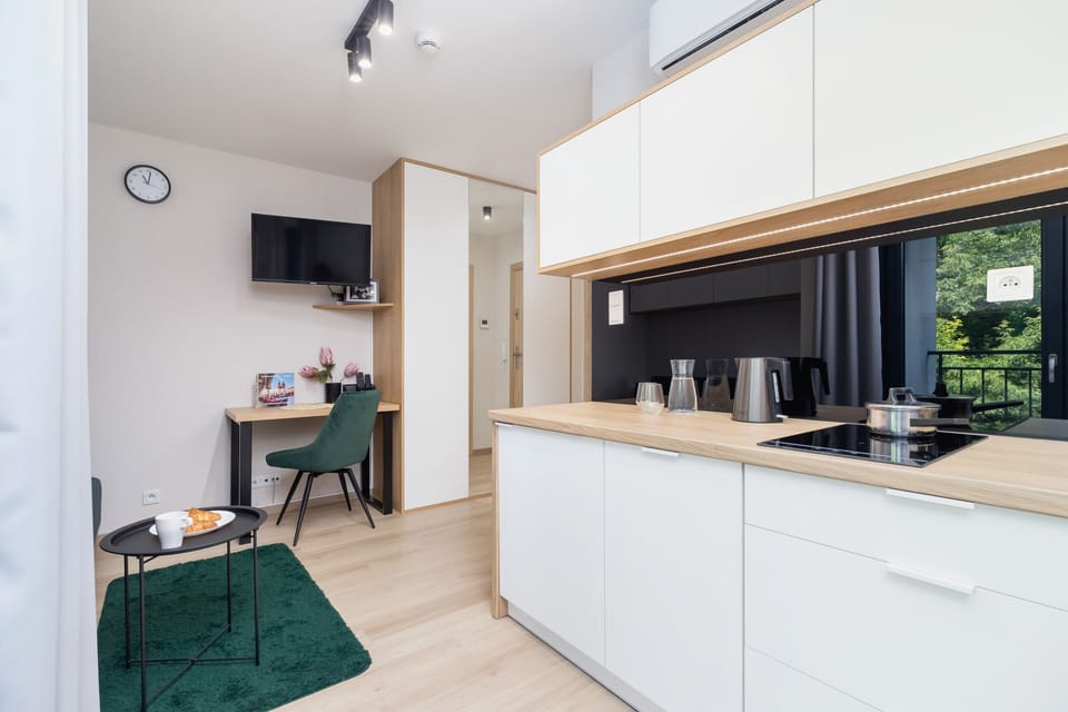 The fully equipped kitchenette includes everything you need for a home-cooked meal.