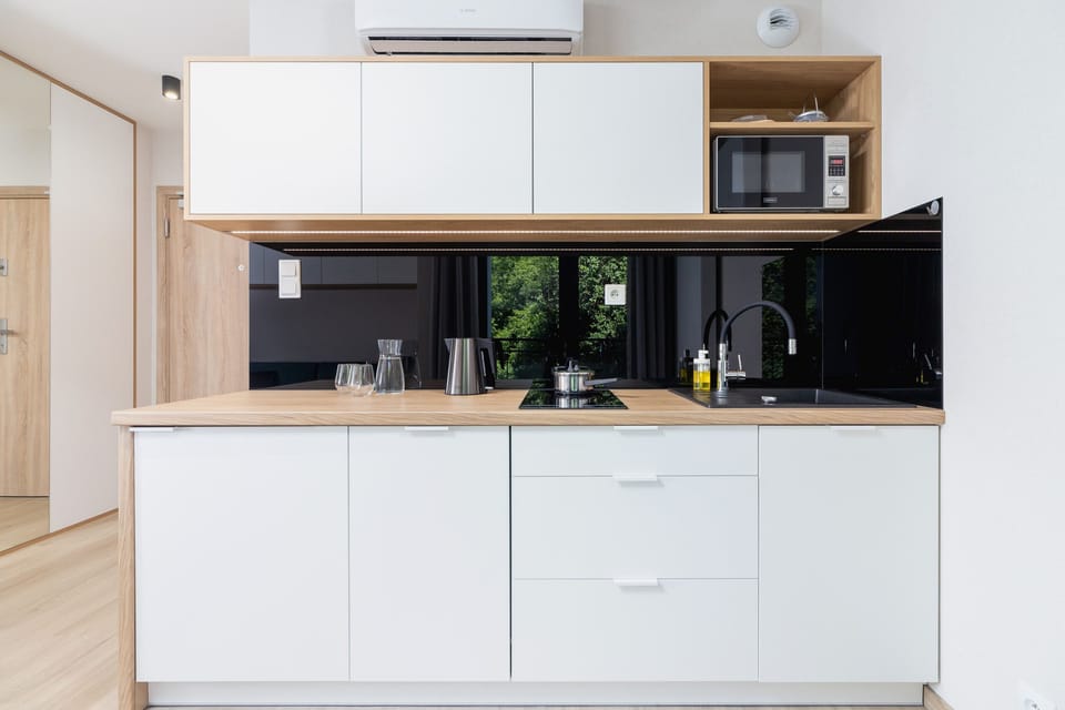 The kitchenette's practical layout maximizes space and functionality.