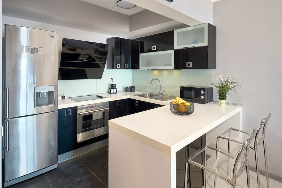 Apartment | Private kitchen | Full-size fridge, microwave, oven, stovetop