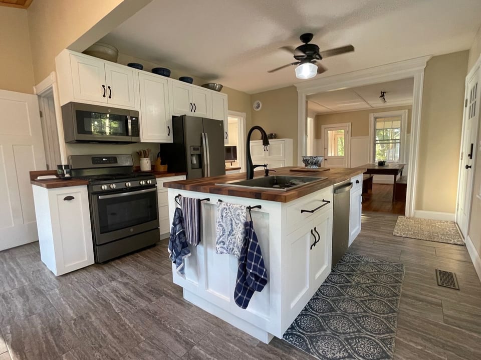 Fully applianced, updated kitchen with 1920's cottage charm.