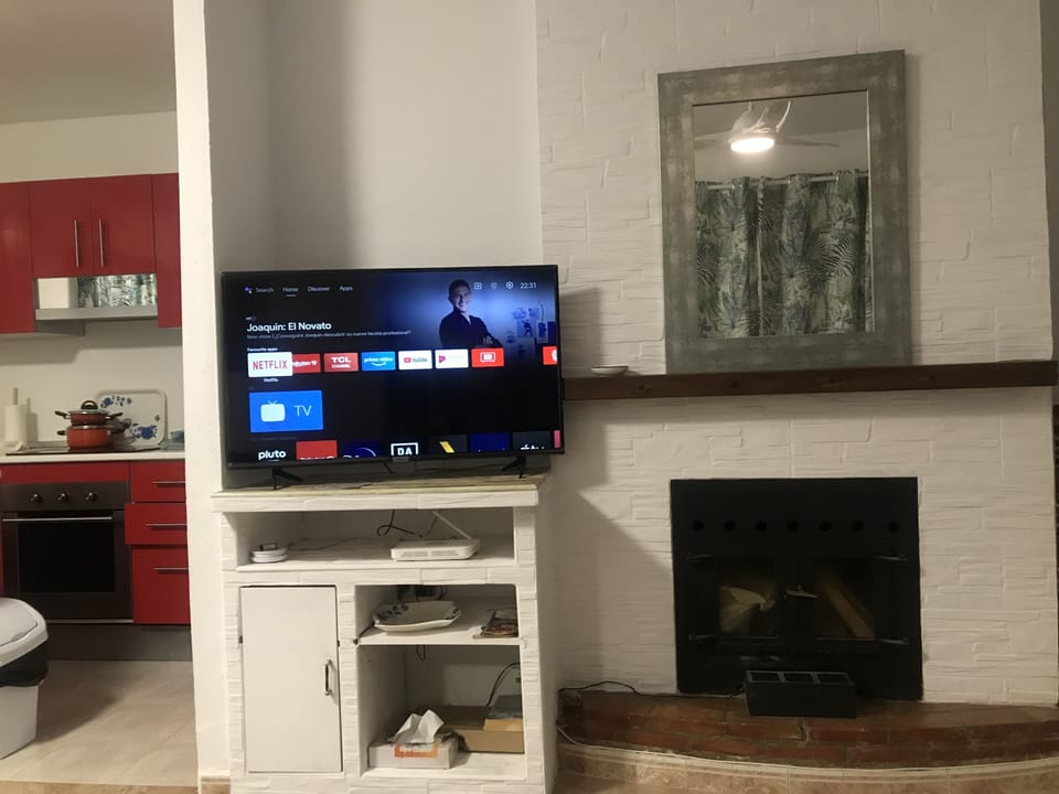Living room smart tv with international channels is AVATEL fast broadband/WiFi