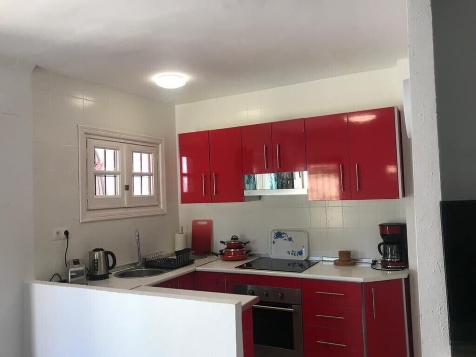 Open plan kitchen with new appliances 
