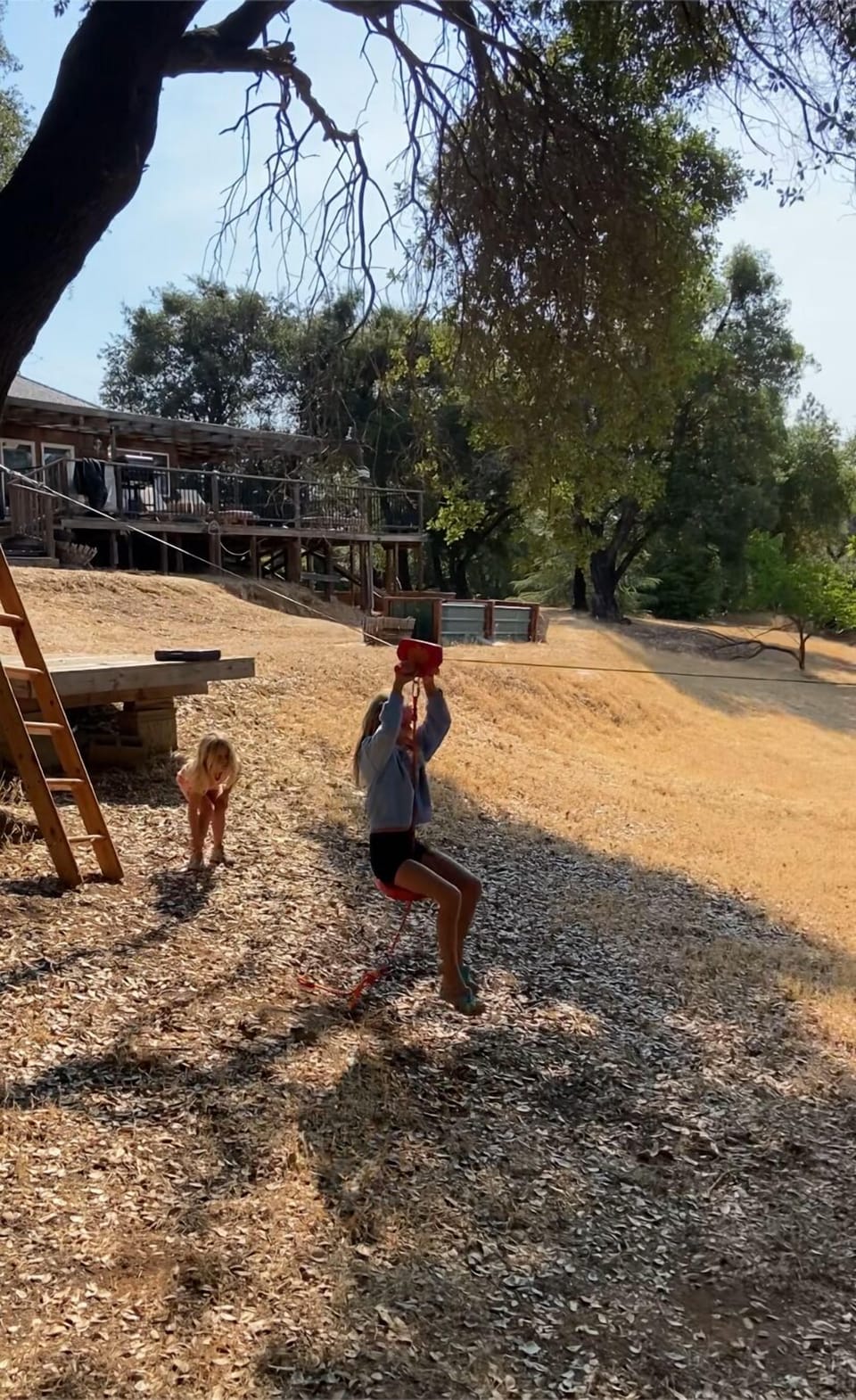 80 foot zip-line. Use at your own risk. Fast and abrupt stop at end!