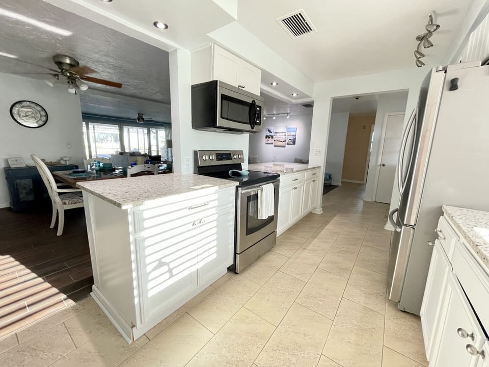 Prepare meals in the fully equipped kitchen. 