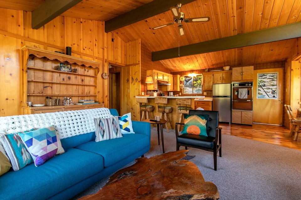 Living Room open floor plan, hallway to bedrooms pictured to left.