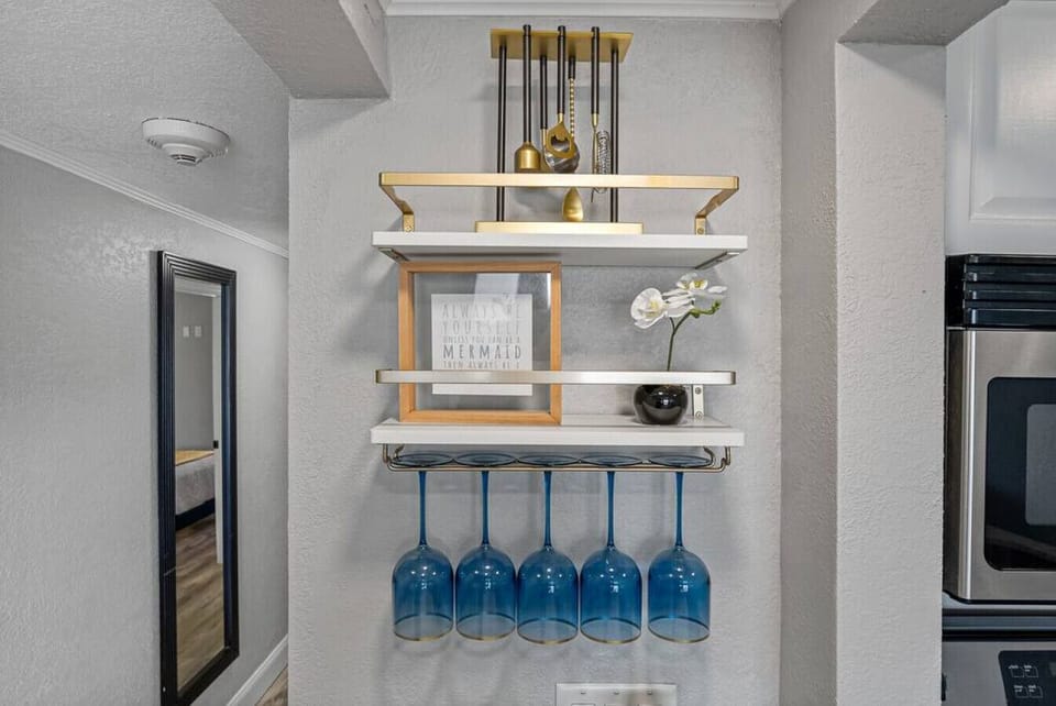 The kitchen provides ample space and basic cooking utensils, plates, and glasses, allowing you to prepare simple meals or experiment with your culinary skills