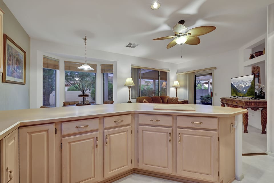 full size well stocked kitchen looking into the Arizona room