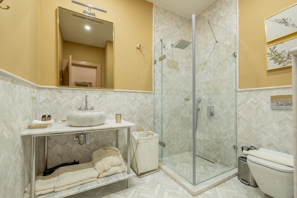 Honeymoon Double Room, Pool Access | Bathroom | Shower, rainfall showerhead, free toiletries, hair dryer