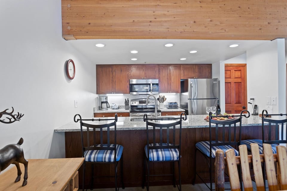 “Room”, ”Indoors”, ”Chair”, ”Furniture”, ”Kitchen”
