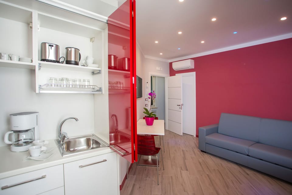 Apartment, 1 Bedroom, Balcony (Via Truglio, 1) | Private kitchenette | Full-size fridge, microwave, stovetop, coffee/tea maker