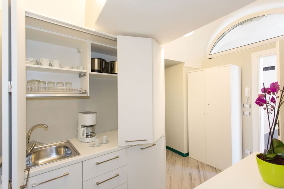 Apartment, 1 Bedroom (Via Truglio, 1) | Private kitchenette | Full-size fridge, microwave, stovetop, coffee/tea maker