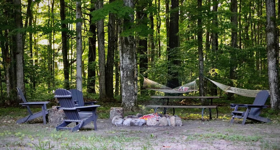 Relax around the fire or in either of the hammocks
