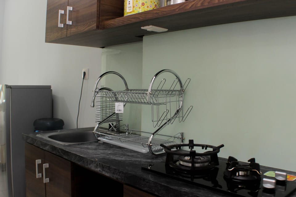 Studio | Private kitchen | Fridge, stovetop, cookware/dishes/utensils, dining tables