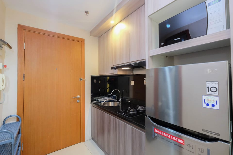Apartment | Private kitchen | Fridge, stovetop, cookware/dishes/utensils