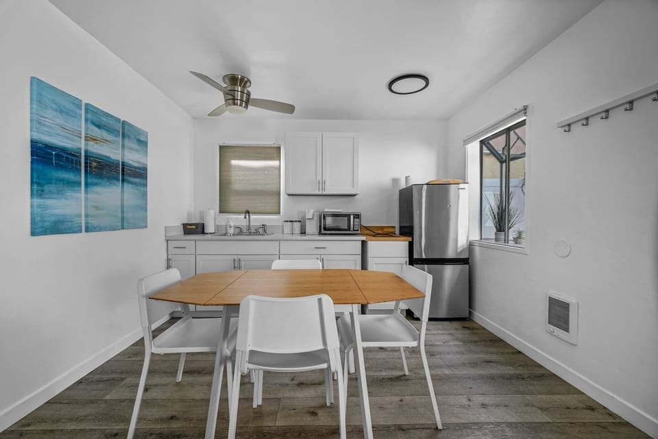Kitchen and dining area. Everything you need to create a family meal and serve. 