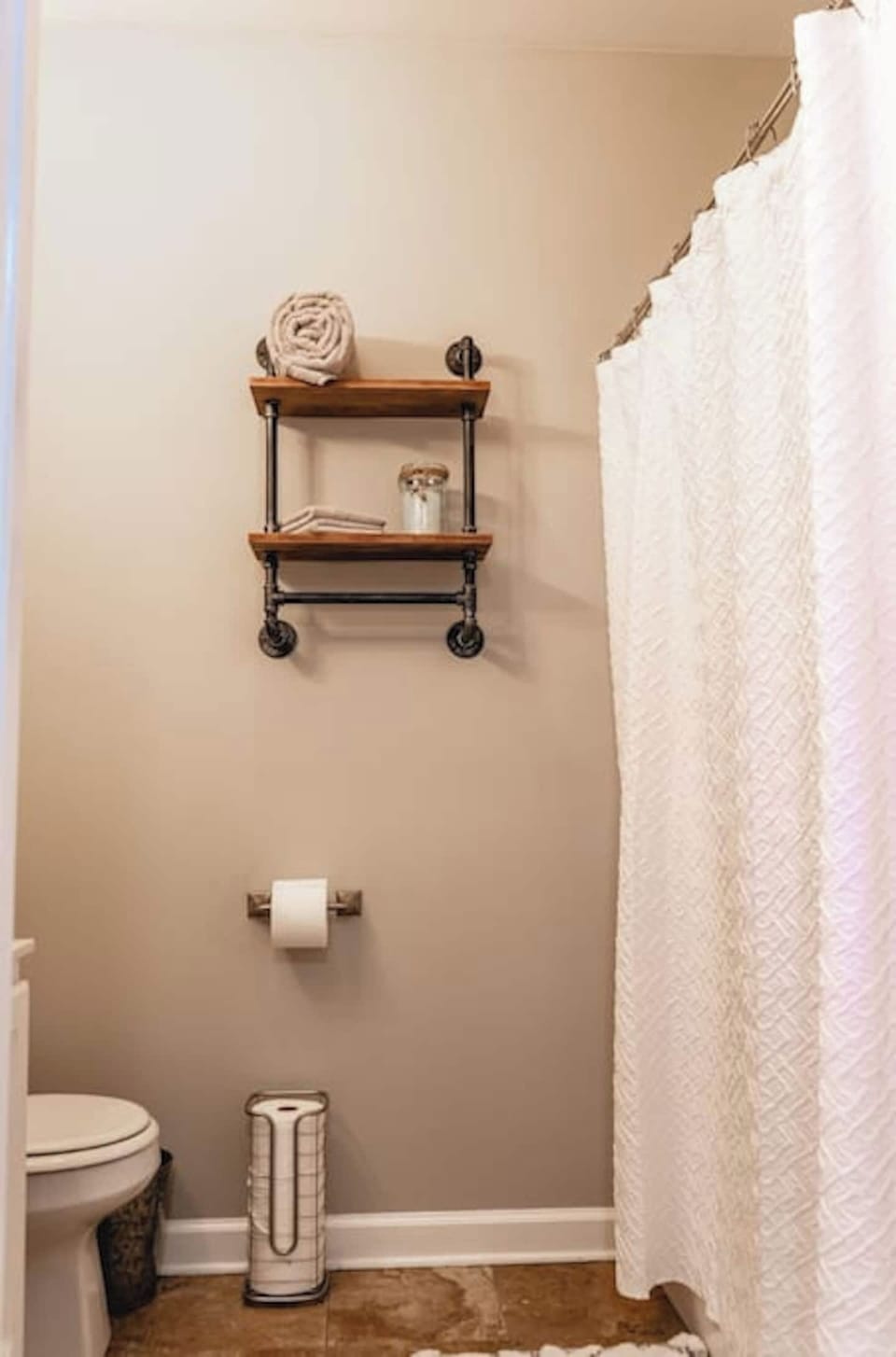 The bathroom comes fully stocked as well including hair dryer, first aid, soaps, toilet paper, etc.