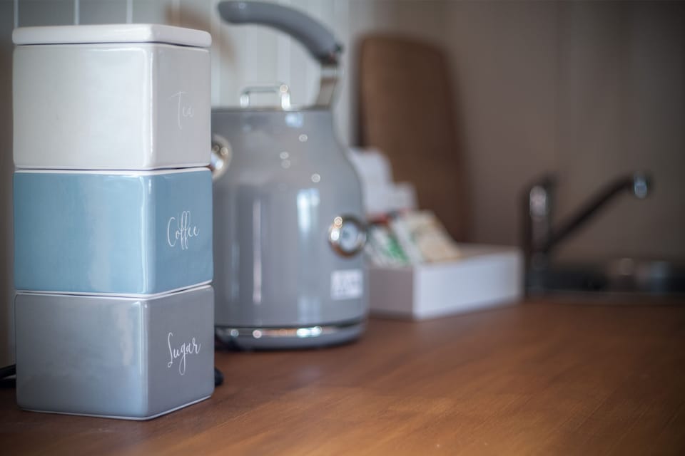 Fridge, stovetop, electric kettle, toaster