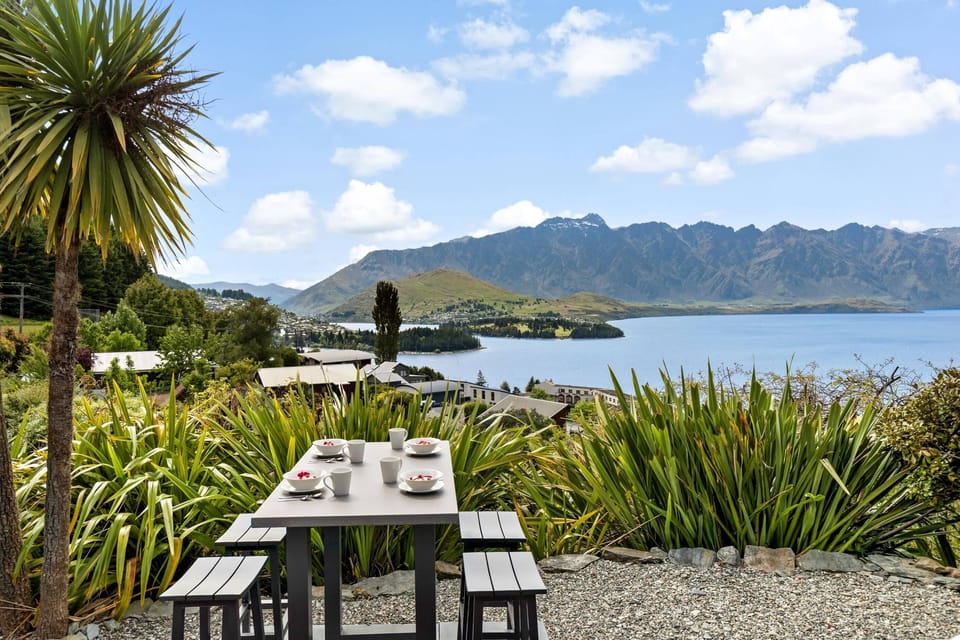 Outdoor Dining Area: Savor meals with breathtaking mountain and lake views—your perfect getaway!