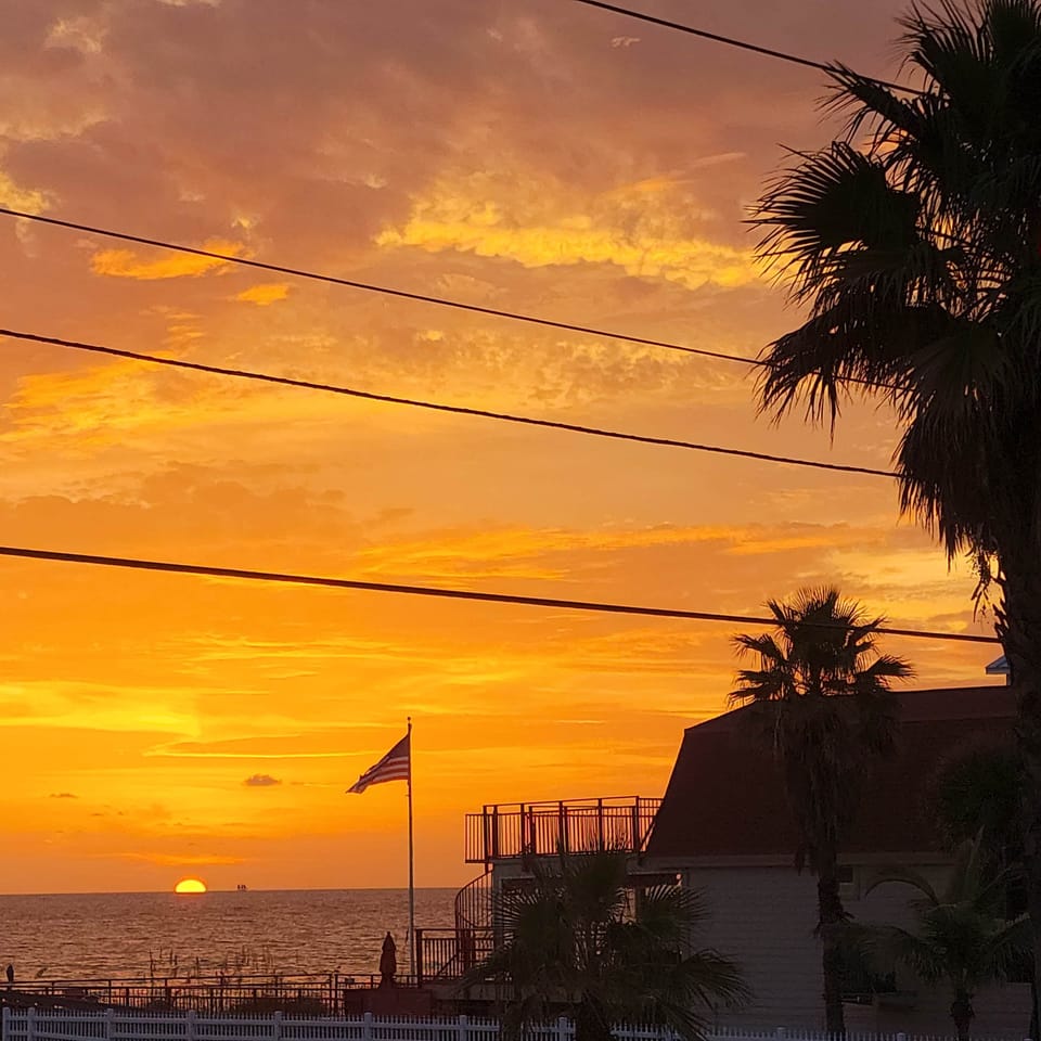 Golden sunsets just steps from your door at Sunset Beach.