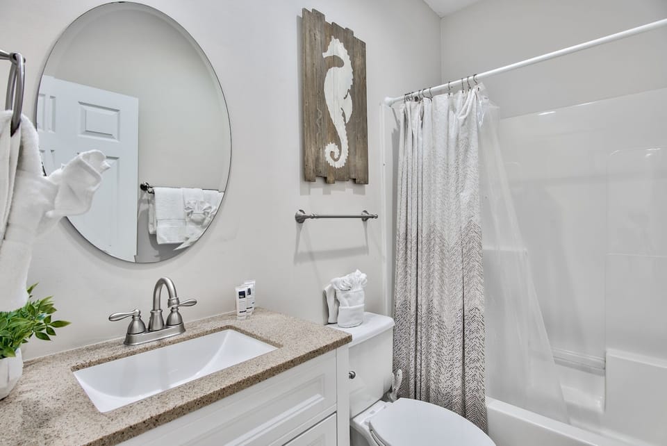 1st floor hall bathroom shared by the two queen rooms