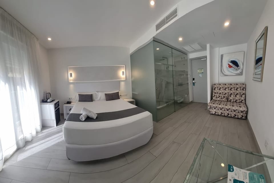 Standard Double or Twin Room, Balcony | Minibar, in-room safe, desk, blackout drapes