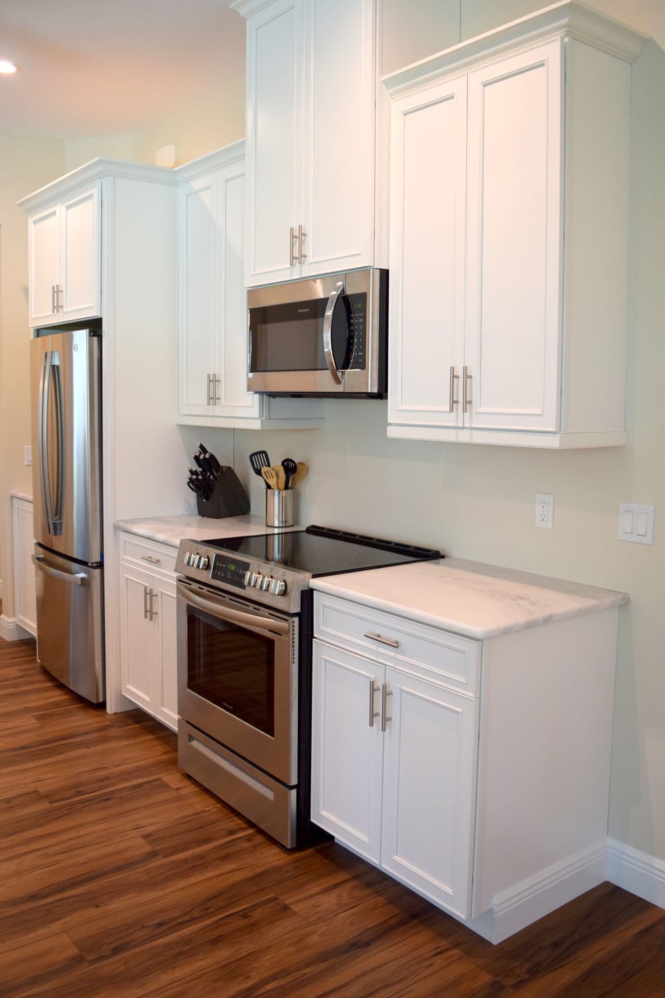 Updated Kitchen with MARBLE counter tops & stainless steel appliances.