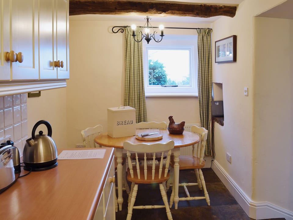 Dining area of the kitchen with view out of the window over the countryside | Dewsnaps Frost - Dewsnaps, Chinley, near Chapel-en-le-Frith