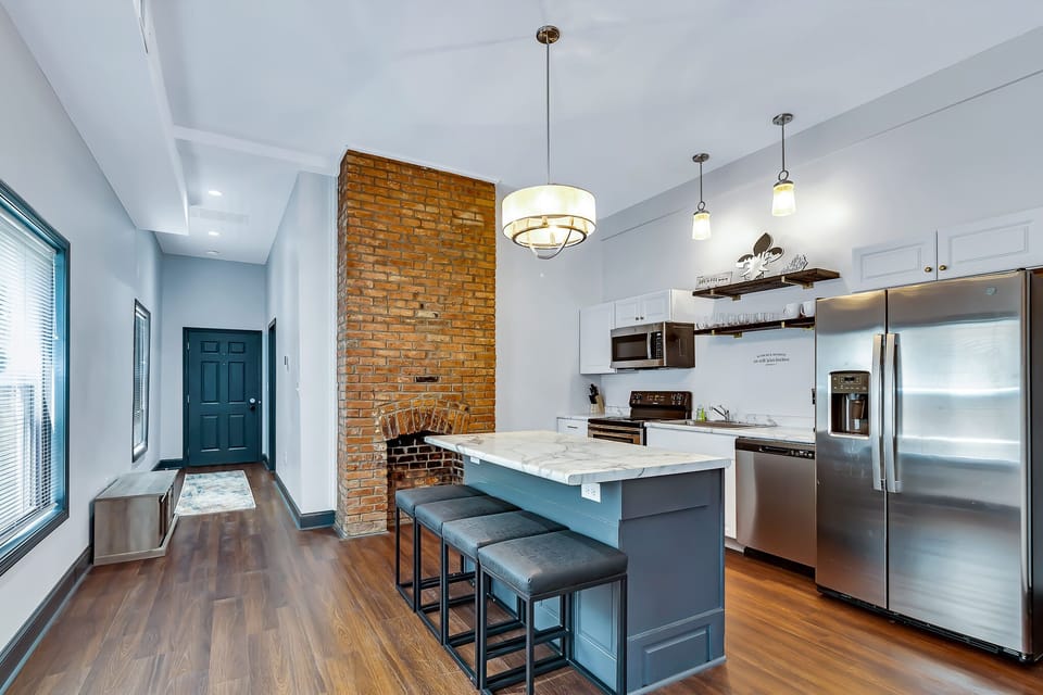 Kitchen with hallway to the back door 