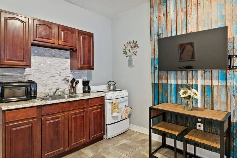 Contemporary kitchen with a cozy breakfast nook, perfect for enjoying your morning coffee.