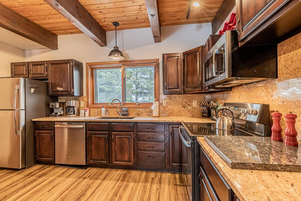Plenty of counter space and modern fixtures make meal prep a breeze after a day of adventure.