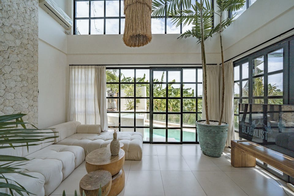 Villa | Living area | 55-inch TV with cable channels